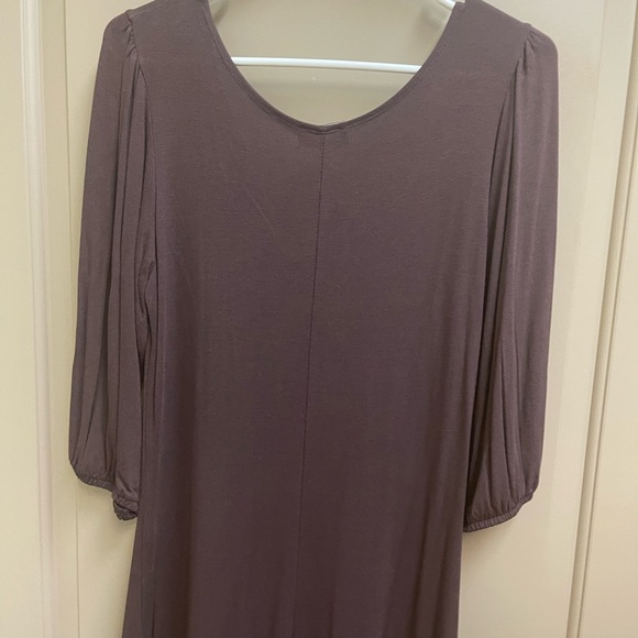 Brown, knit dress with pleated front and 3/4 length sleeves. - Picture 2 of 3